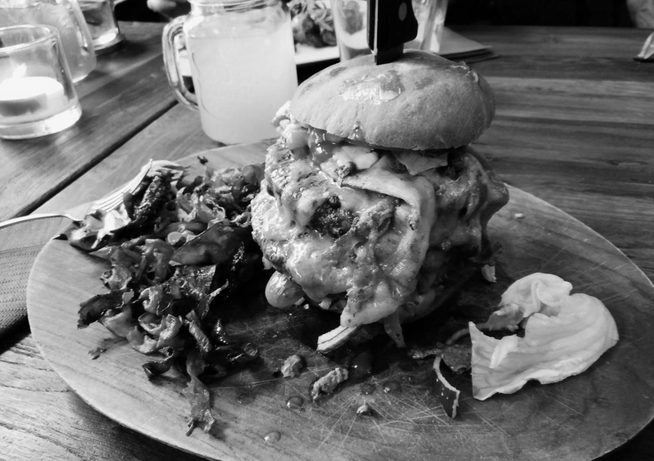 Close-up of elegantly plated dish showing layered components and thoughtful color arrangement